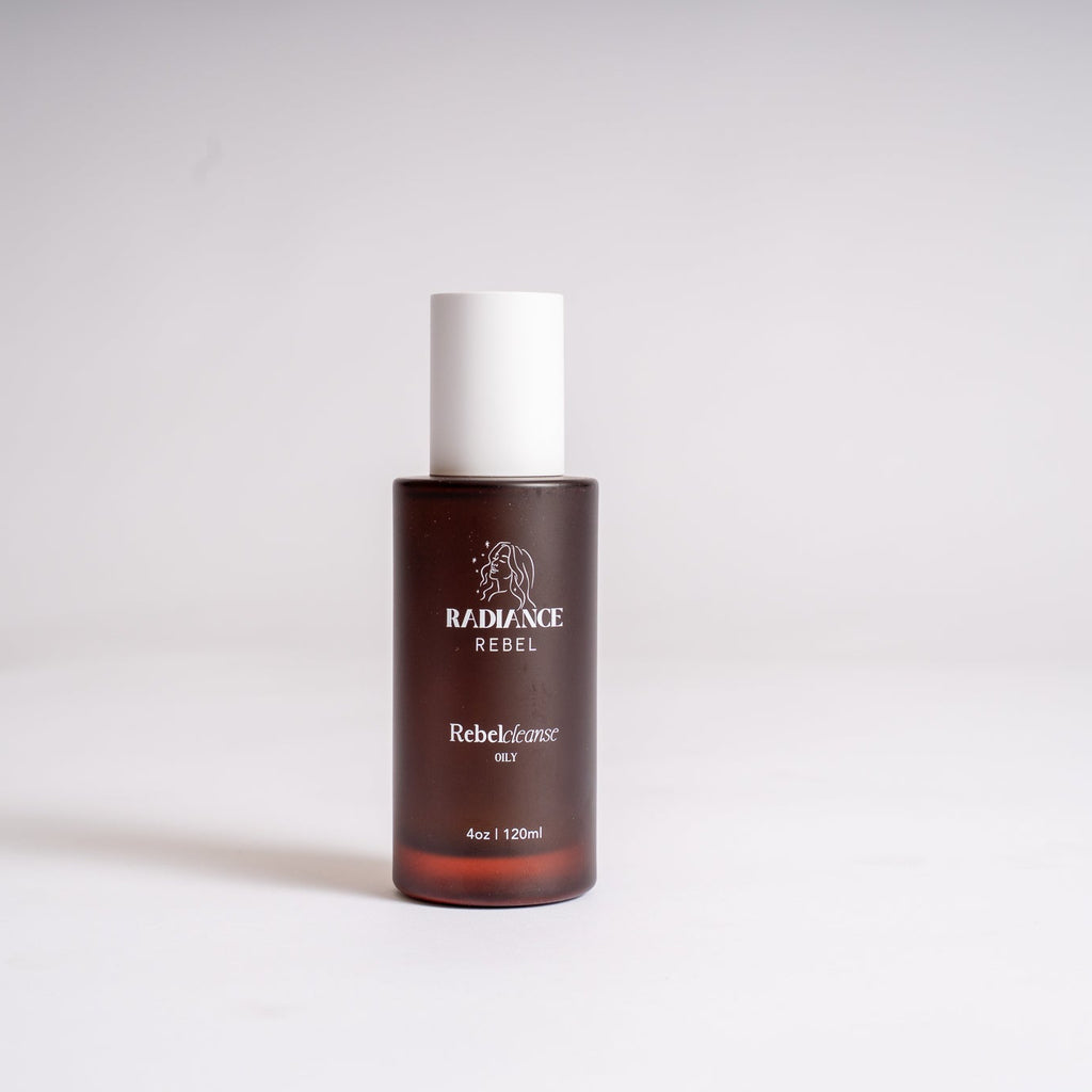 A bottle of Radiance Rebel Skincare RebelCleanse Oily standing upright on a light gray surface against a light gray background.